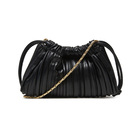 Ženska torba Calvin Klein DRAWSTRING PLISSE CONV MINI CB P