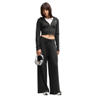 Ženska trenerka donji dio Puma ESS Ribbed Wide Leg Soft Touch Pants op